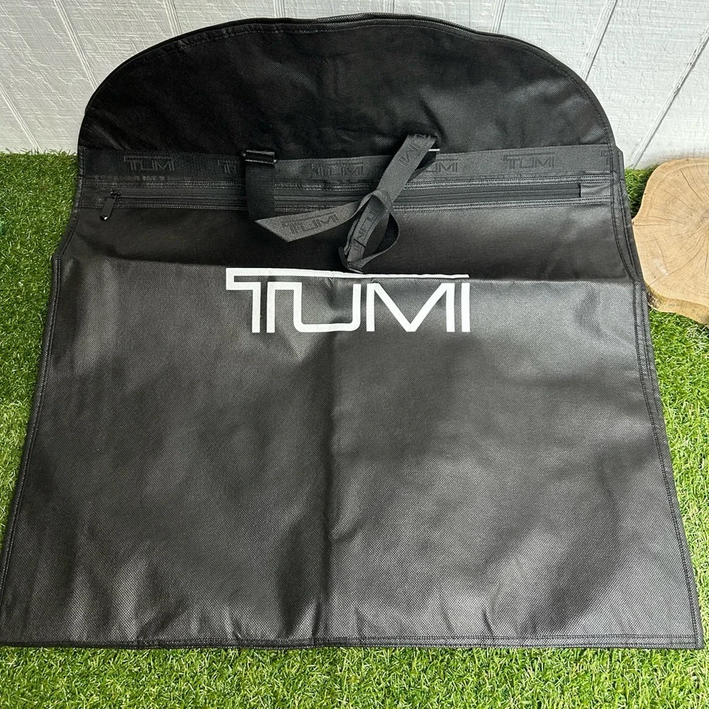 Tumi Travel Garment Bag black suits and dresses, during travel NEW 52” long 23”
